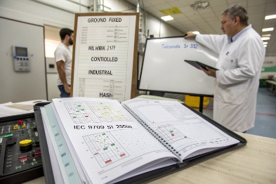 Engineers validate industrial SIP intercom wiring diagrams and IEC compliance in test lab