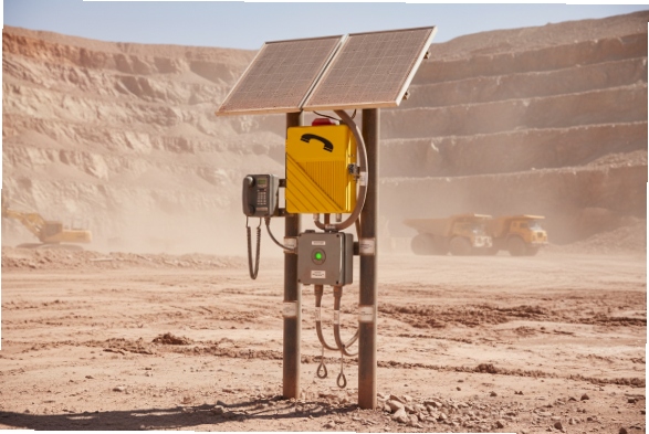 Solar powered SIP emergency phone station with panels and control box in open pit