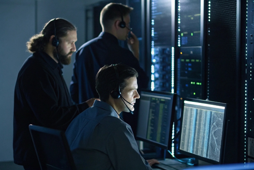 Data center workers, managing communication systems