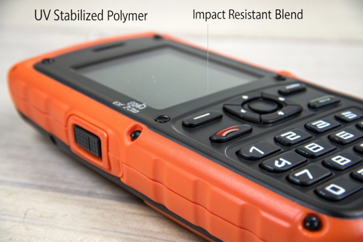 Rugged orange handheld terminal with keypad featuring UV stabilized polymer and impact resistance