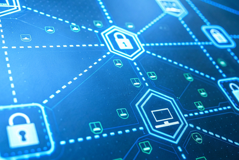 Digital illustration of a secure network map with glowing blue lines connecting hexagon icons of locks and computer screens, representing encrypted, protected communication paths.