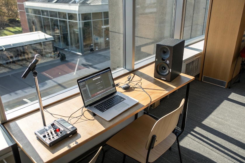 Microphone, laptop, and speaker in a sound test setup