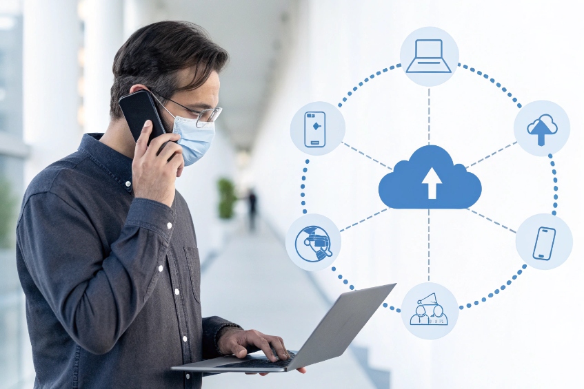 Remote worker on mobile and laptop connected to cloud communications platform