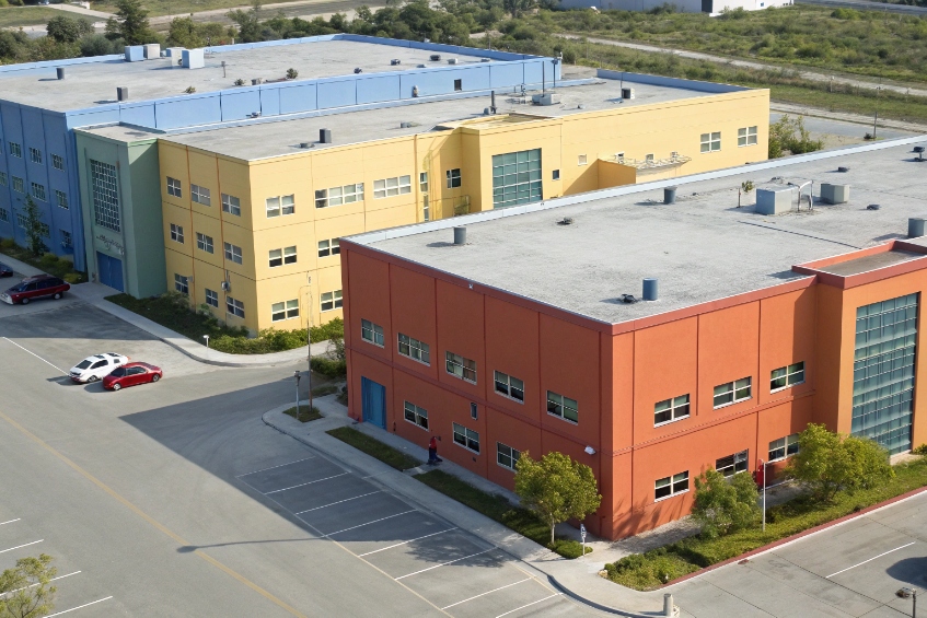 Aerial view of colorful multi-building business campus for site-wide paging coverage